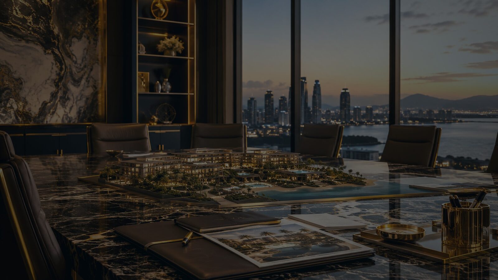 A private boardroom overlooking a harbour skyline with a hospitality development model on the table